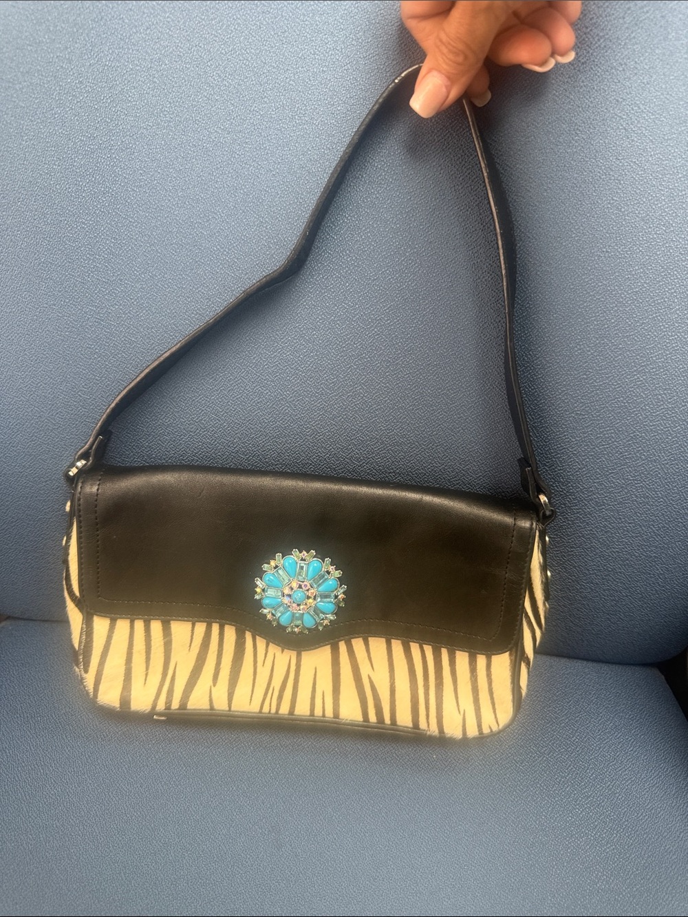 Harold's Black and Cream Zebra-Print Shoulder Bag with Turquoise Medallion